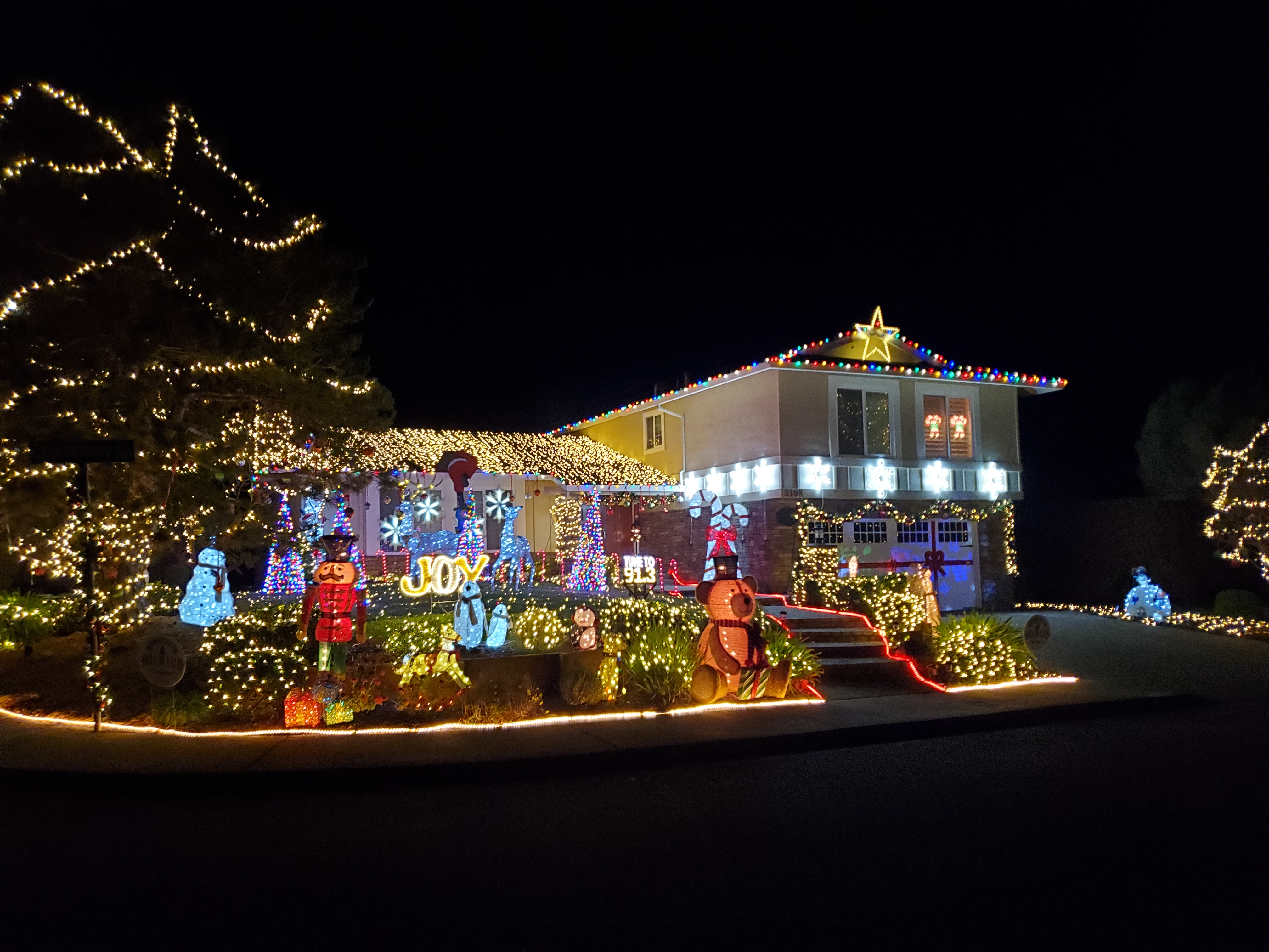 Corner Orchard Christmas light show at a Pleasanton, CA home at night